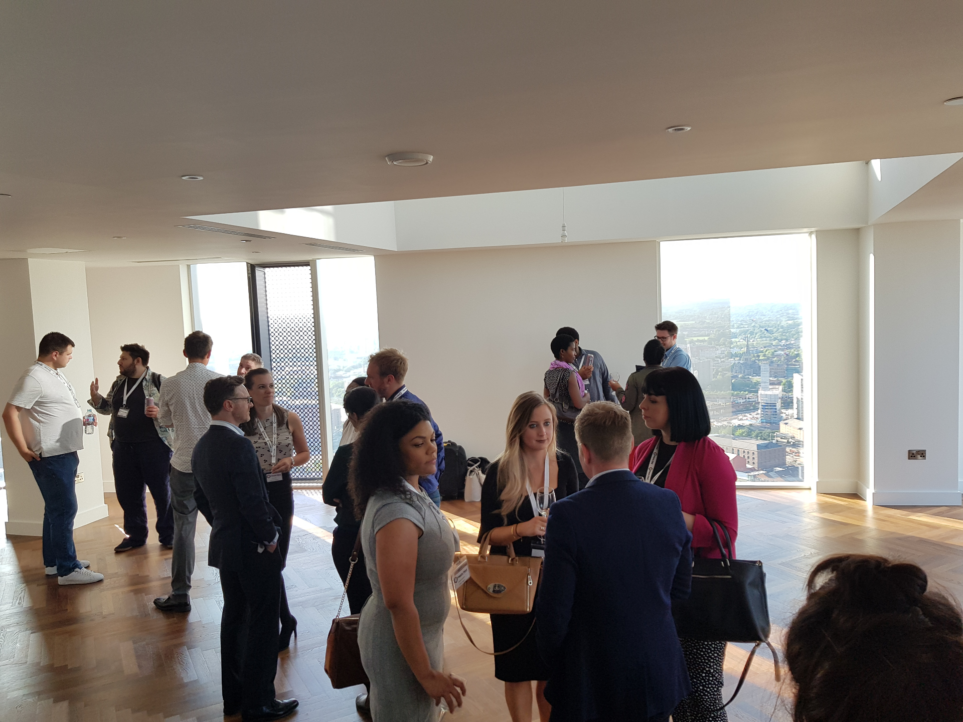 Guests enjoying drinks and after-work business networking at a stylish Manchester venue